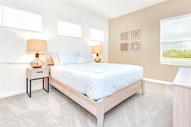 2496 Rama Dr, Kissimmee, FL 34746 - carpeted bedroom with baseboards
