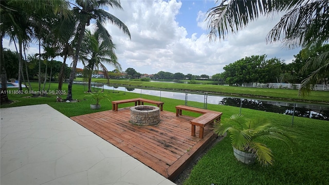 9480 NW 10th St, Plantation, FL 33322 - view of patio / terrace with an outdoor fire pit and a deck with water view