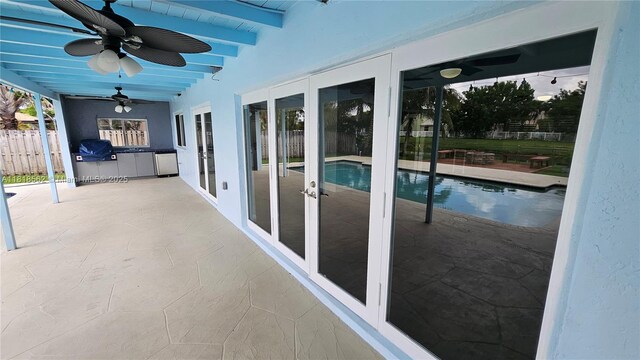 9480 NW 10th St, Plantation, FL 33322 - view of pool with french doors, ceiling fan, a patio, and area for grilling