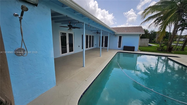 9480 NW 10th St, Plantation, FL 33322 - swimming pool featuring french doors, ceiling fan, and a patio area