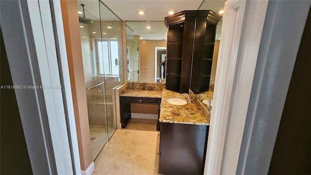 9480 NW 10th St, Plantation, FL 33322 - full bath featuring vanity, a shower stall, tile patterned floors, and recessed lighting