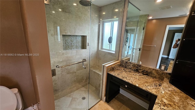 9480 NW 10th St, Plantation, FL 33322 - bathroom with a stall shower, toilet, vanity, and tile patterned flooring