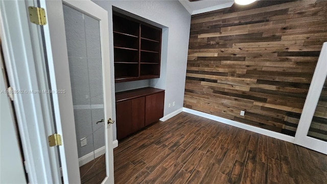9480 NW 10th St, Plantation, FL 33322 - spare room with wood walls, dark wood-style flooring, and baseboards