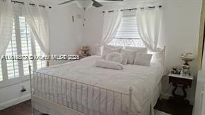 9480 NW 10th St, Plantation, FL 33322 - bedroom featuring a ceiling fan