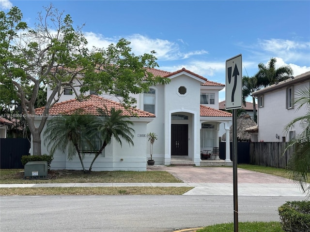 16650 SW 61st Ln, Miami, FL 33193 - mediterranean / spanish house featuring a tile roof and stucco siding