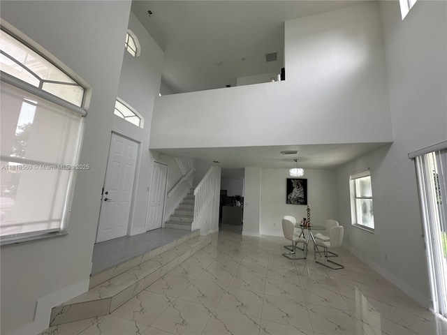 16650 SW 61st Ln, Miami, FL 33193 - foyer featuring a high ceiling, stairs, and marble finish flooring