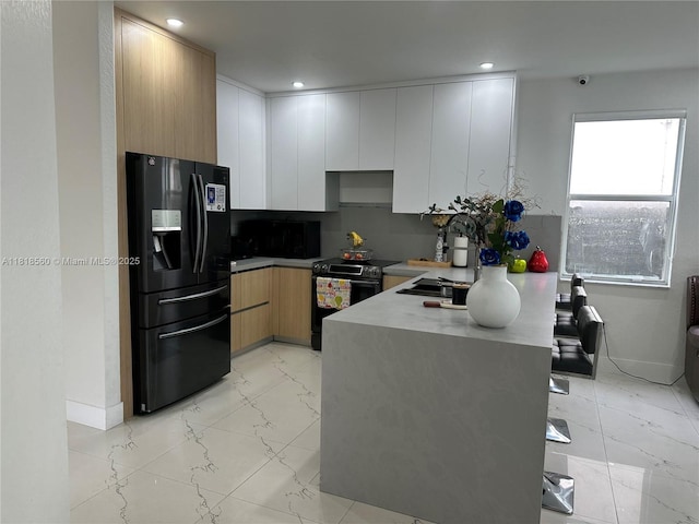 16650 SW 61st Ln, Miami, FL 33193 - kitchen featuring black refrigerator with ice dispenser, electric range oven, modern cabinets, a peninsula, and recessed lighting