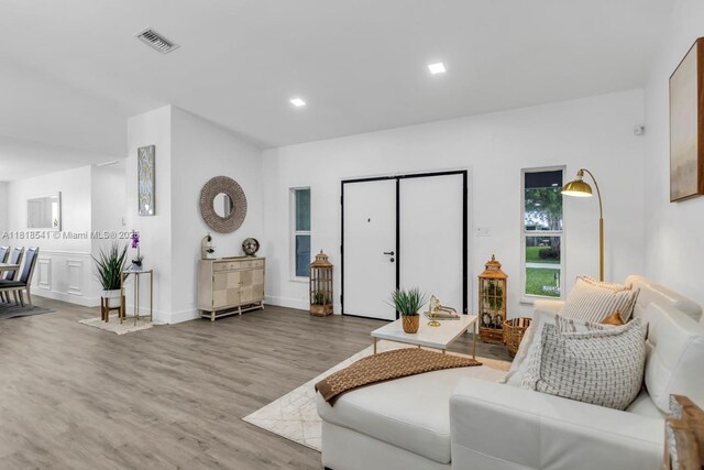 11400 NW 27th St, Plantation, FL 33323 - living area featuring wood finished floors and recessed lighting