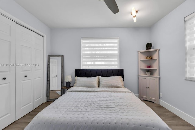 11400 NW 27th St, Plantation, FL 33323 - bedroom featuring a closet, dark wood finished floors, a ceiling fan, and baseboards