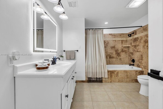 11400 NW 27th St, Plantation, FL 33323 - bathroom with vanity, tiled shower / bath, and tile patterned flooring