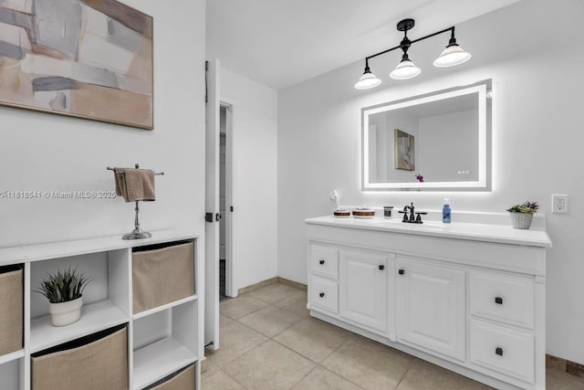 11400 NW 27th St, Plantation, FL 33323 - bathroom with vanity, baseboards, and tile patterned floors