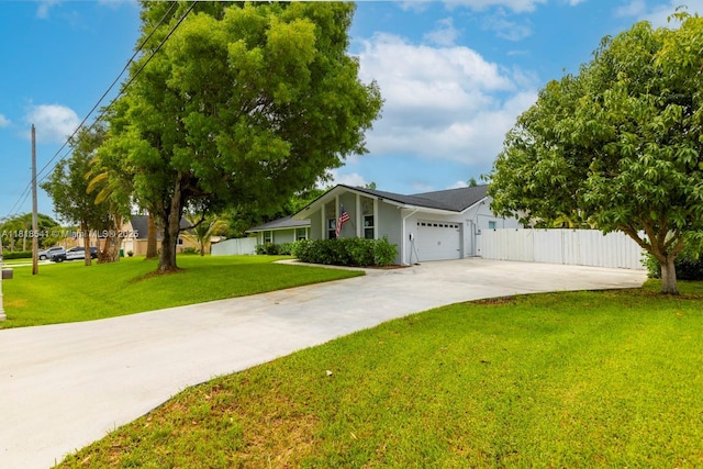 11400 NW 27th St, Plantation, FL 33323 - view of front of home with driveway, an attached garage, and stucco siding