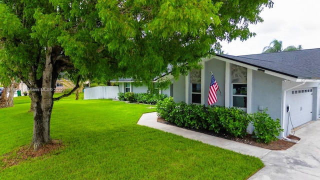 11400 NW 27th St, Plantation, FL 33323 - view of grassy yard with a garage and driveway