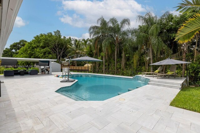 11400 NW 27th St, Plantation, FL 33323 - outdoor pool with a patio area and outdoor lounge area