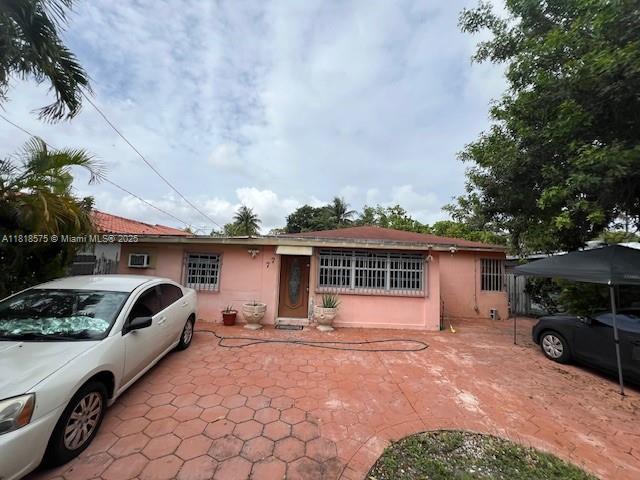 77 NW Blvd, Miami, FL 33126 - view of front of house featuring stucco siding