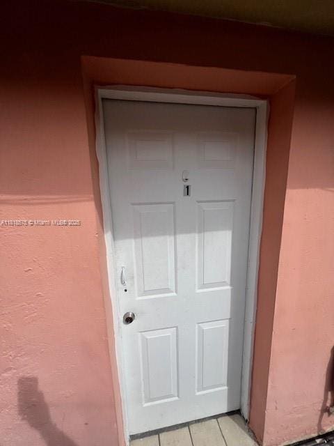 77 NW Blvd, Miami, FL 33126 - entrance to property with stucco siding