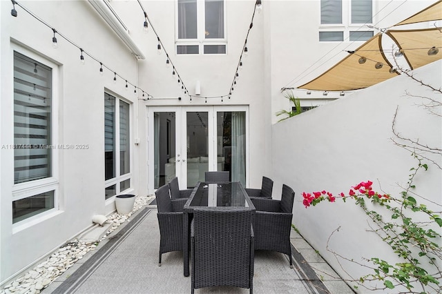 10540 NW 63rd Ter, Doral, FL 33178 - view of patio / terrace with french doors and outdoor dining area