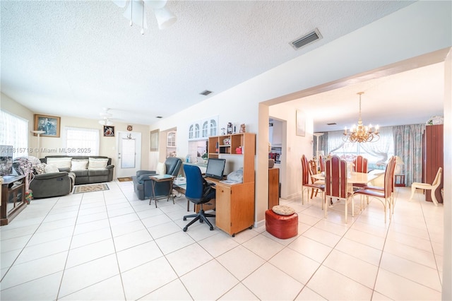 5803 NW 85th Ter, Tamarac, FL 33321 - living area featuring a chandelier, a textured ceiling, light tile patterned flooring, a ceiling fan, and an office area
