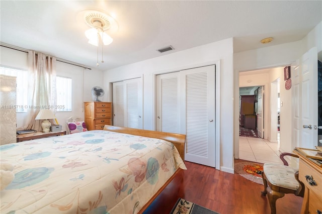 5803 NW 85th Ter, Tamarac, FL 33321 - bedroom featuring multiple closets and wood finished floors