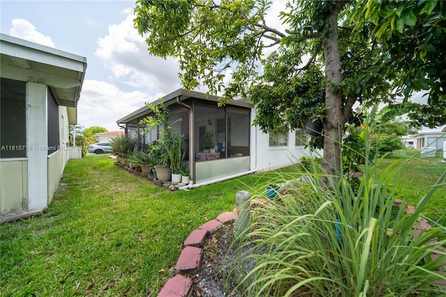 5803 NW 85th Ter, Tamarac, FL 33321 - view of green lawn featuring a sunroom
