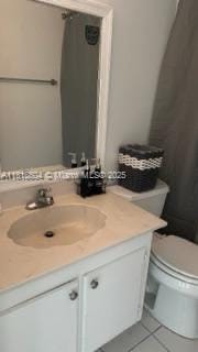 2000 NE 135th St Unit 509, North Miami, FL 33181 - bathroom with vanity and tile patterned flooring