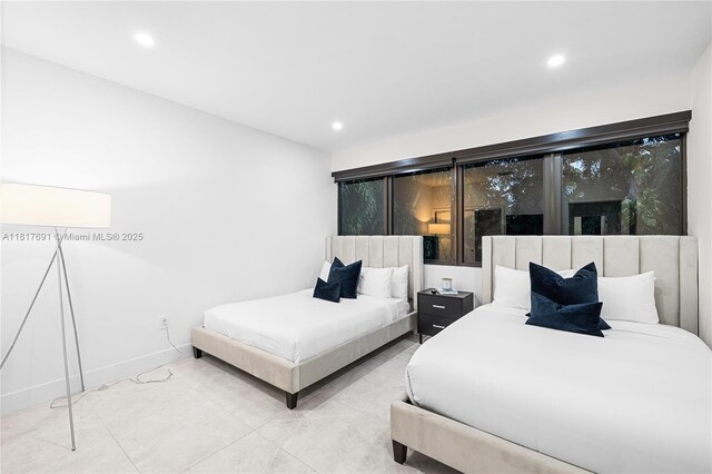 3660 SW 12th St, Miami, FL 33135 - bedroom with recessed lighting and tile patterned floors