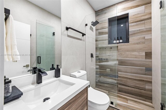 3660 SW 12th St, Miami, FL 33135 - bathroom with vanity, a stall shower, and toilet