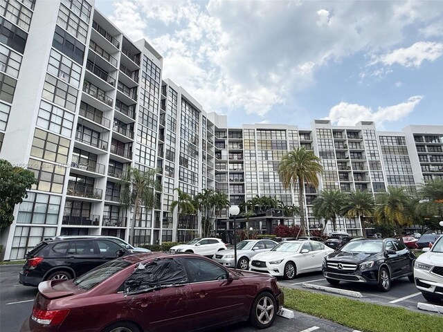 800 Parkview Dr Unit 820, Hallandale Beach, FL 33009 - view of apartment building / complex featuring uncovered parking
