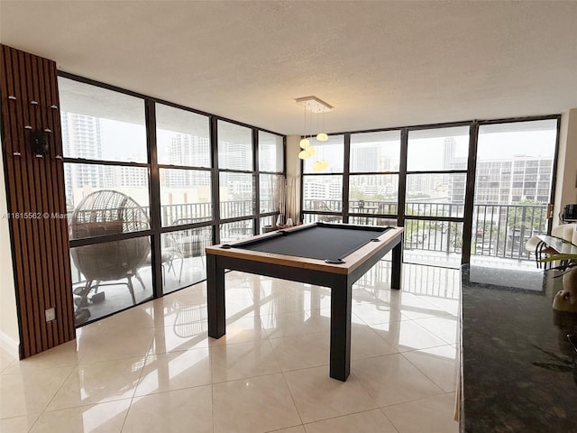 800 Parkview Dr Unit 820, Hallandale Beach, FL 33009 - game room featuring expansive windows, healthy amount of natural light, billiards table, and light tile patterned floors