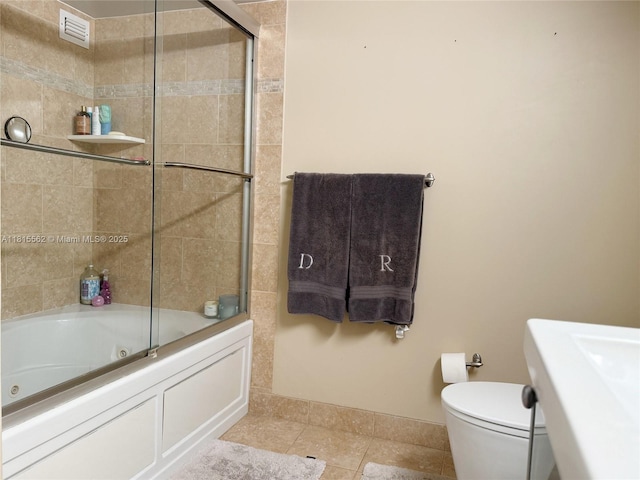 800 Parkview Dr Unit 820, Hallandale Beach, FL 33009 - full bath featuring tile patterned flooring, toilet, and a combined bath / shower with jetted tub