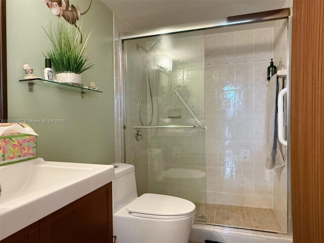 800 Parkview Dr Unit 820, Hallandale Beach, FL 33009 - bathroom with a shower stall, toilet, and vanity