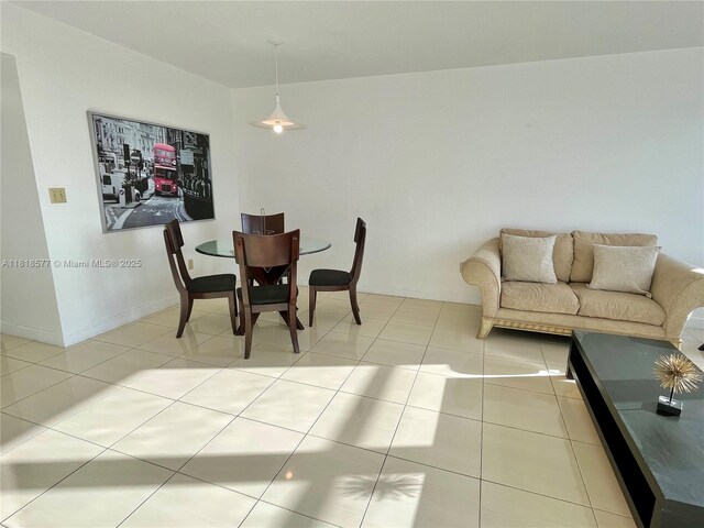 2899 Collins Ave Unit 810, Miami Beach, FL 33140 - dining space with light tile patterned floors