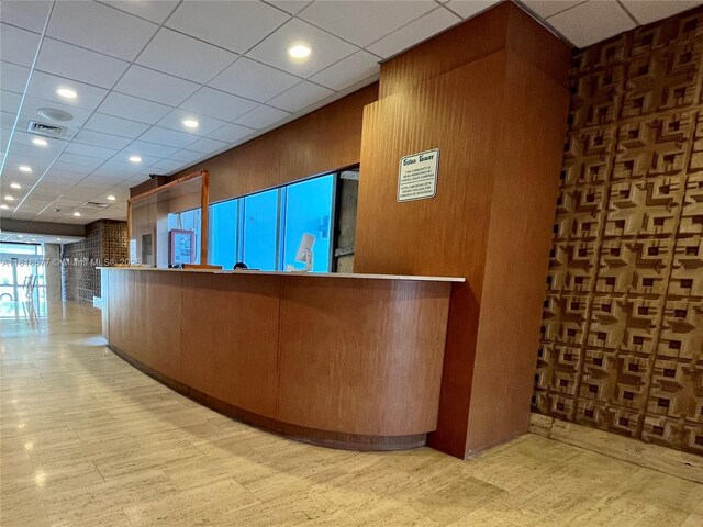 2899 Collins Ave Unit 810, Miami Beach, FL 33140 - reception area featuring a drop ceiling