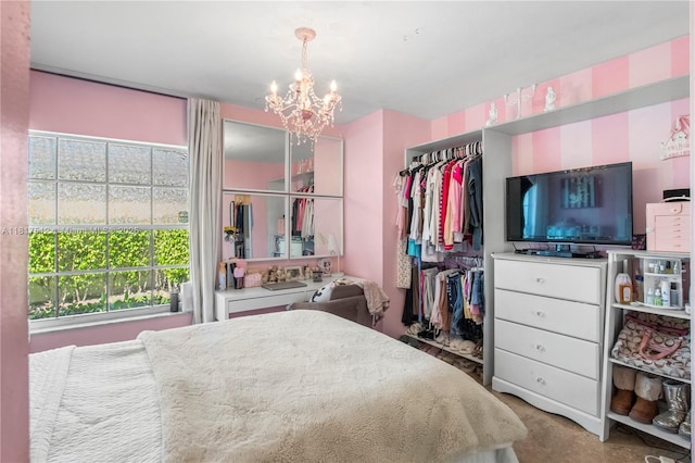 886 SW 180th Ter, Pembroke Pines, FL 33029 - bedroom with a chandelier, a closet, and carpet