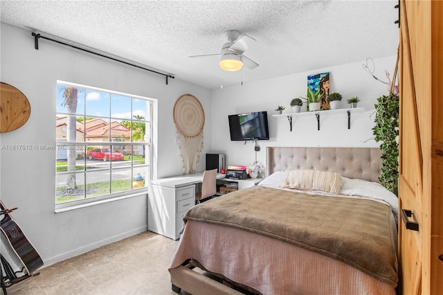 886 SW 180th Ter, Pembroke Pines, FL 33029 - bedroom featuring multiple windows, a textured ceiling, and ceiling fan