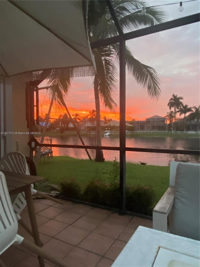 886 SW 180th Ter, Pembroke Pines, FL 33029 - view of patio / terrace featuring a water view and glass enclosure