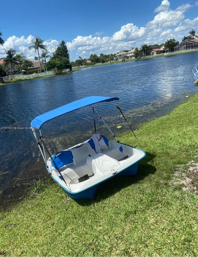 886 SW 180th Ter, Pembroke Pines, FL 33029 - dock with a water view and a yard