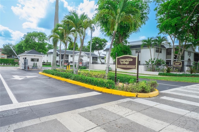 18785 NW 62nd Ave Unit 106, Hialeah, FL 33015 - view of asphalt street featuring a residential view and curbs