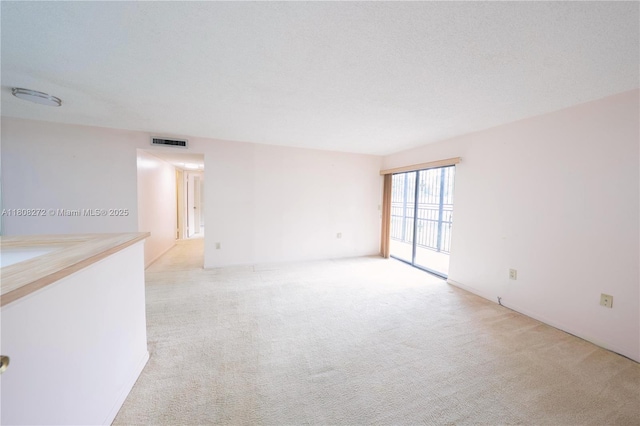 18785 NW 62nd Ave Unit 106, Hialeah, FL 33015 - empty room with light carpet