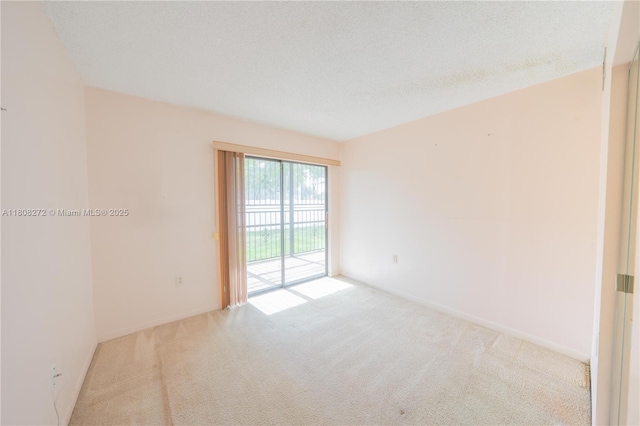 18785 NW 62nd Ave Unit 106, Hialeah, FL 33015 - spare room featuring carpet and baseboards