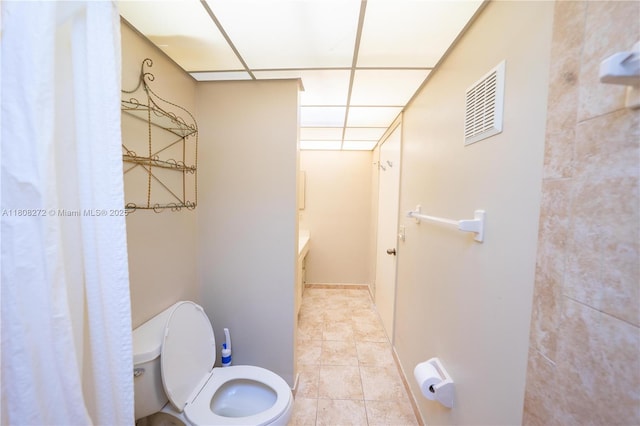 18785 NW 62nd Ave Unit 106, Hialeah, FL 33015 - full bath with a paneled ceiling and tile patterned flooring