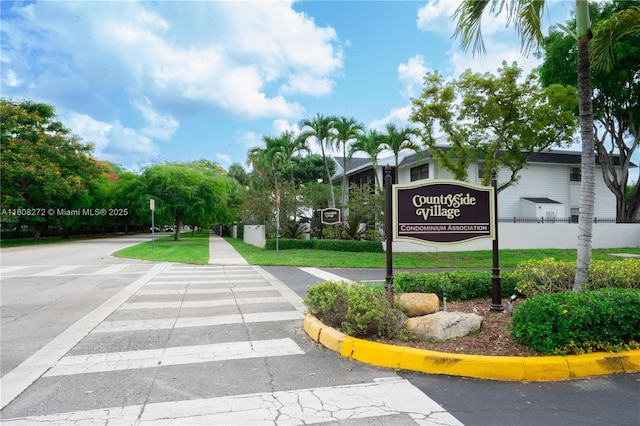 18785 NW 62nd Ave Unit 106, Hialeah, FL 33015 - view of community sign