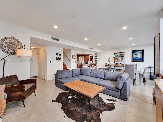 1408 Brickell Bay Dr Unit 411, Miami, FL 33131 - living room featuring recessed lighting, light tile patterned floors, stairway, and bar
