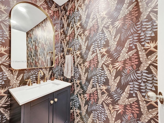 1408 Brickell Bay Dr Unit 411, Miami, FL 33131 - half bath with wallpapered walls and vanity