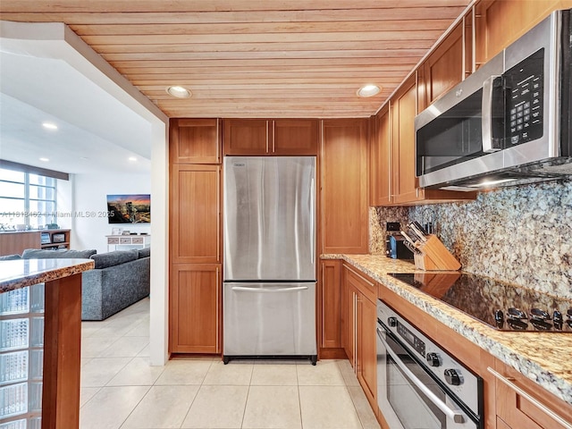 1408 Brickell Bay Dr Unit 411, Miami, FL 33131 - kitchen with stainless steel appliances, wooden ceiling, light tile patterned floors, backsplash, and brown cabinetry