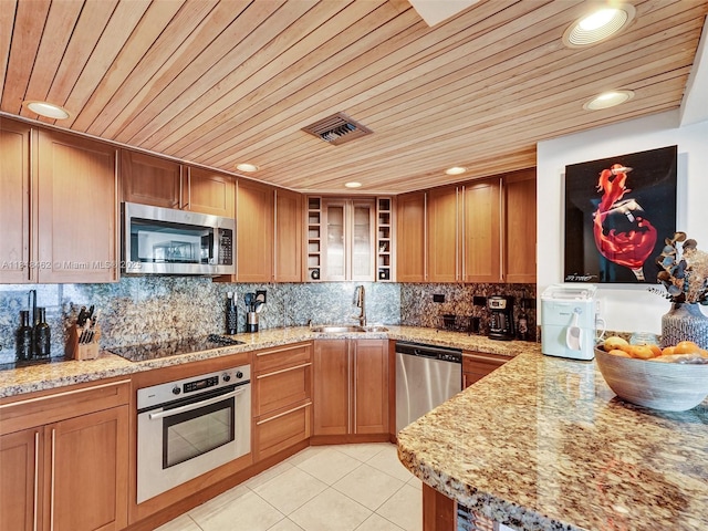 1408 Brickell Bay Dr Unit 411, Miami, FL 33131 - kitchen with appliances with stainless steel finishes, open shelves, wooden ceiling, light tile patterned floors, and backsplash