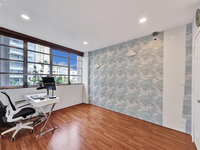 1408 Brickell Bay Dr Unit 411, Miami, FL 33131 - office space featuring wallpapered walls, an accent wall, wood finished floors, and recessed lighting