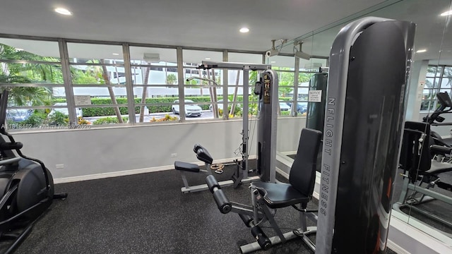 1408 Brickell Bay Dr Unit 411, Miami, FL 33131 - workout area with baseboards and recessed lighting