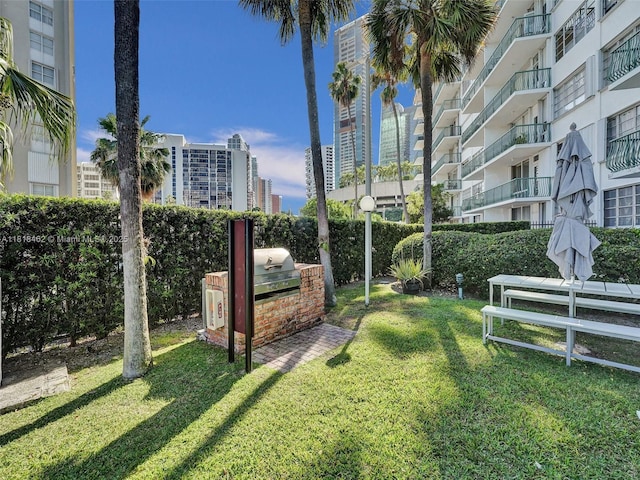 1408 Brickell Bay Dr Unit 411, Miami, FL 33131 - view of property's community featuring a yard and a view of city