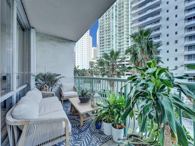 1408 Brickell Bay Dr Unit 411, Miami, FL 33131 - balcony with a view of city and an outdoor living space